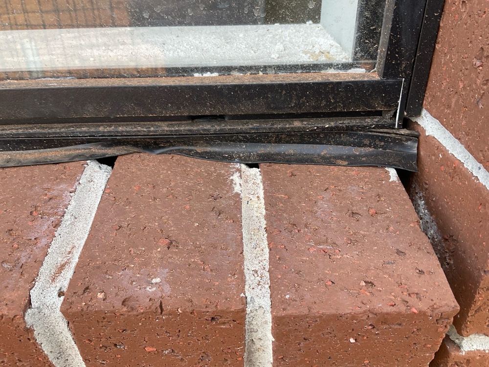 Window flashing not seated between the window and cladding, found during a fixing inspection in Tarneit