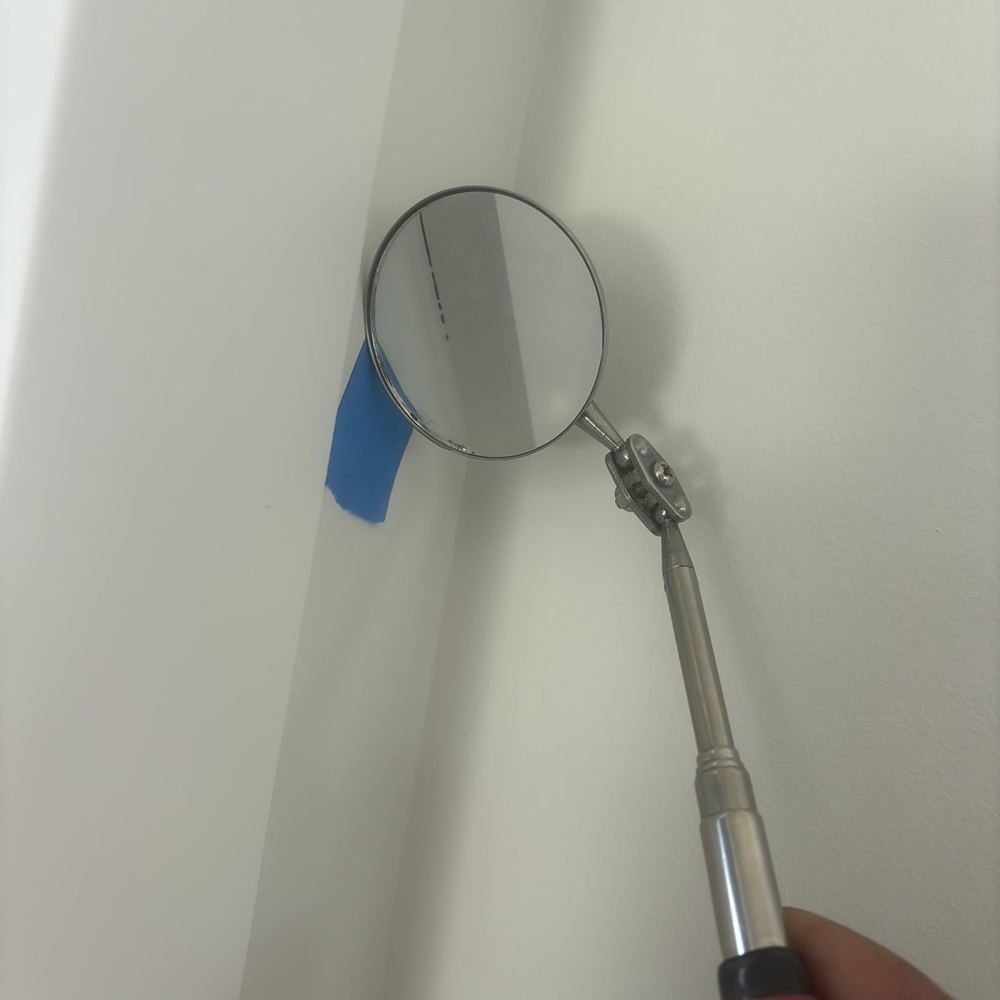Open gaps left where mouldings meet the wall and ceiling, found during a pre-handover inspection in Tarneit
