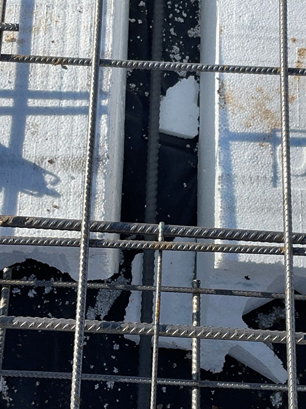 Offcuts and debris left in the slab that must come out before the pour, found during a slab pre-pour inspection in Tarneit