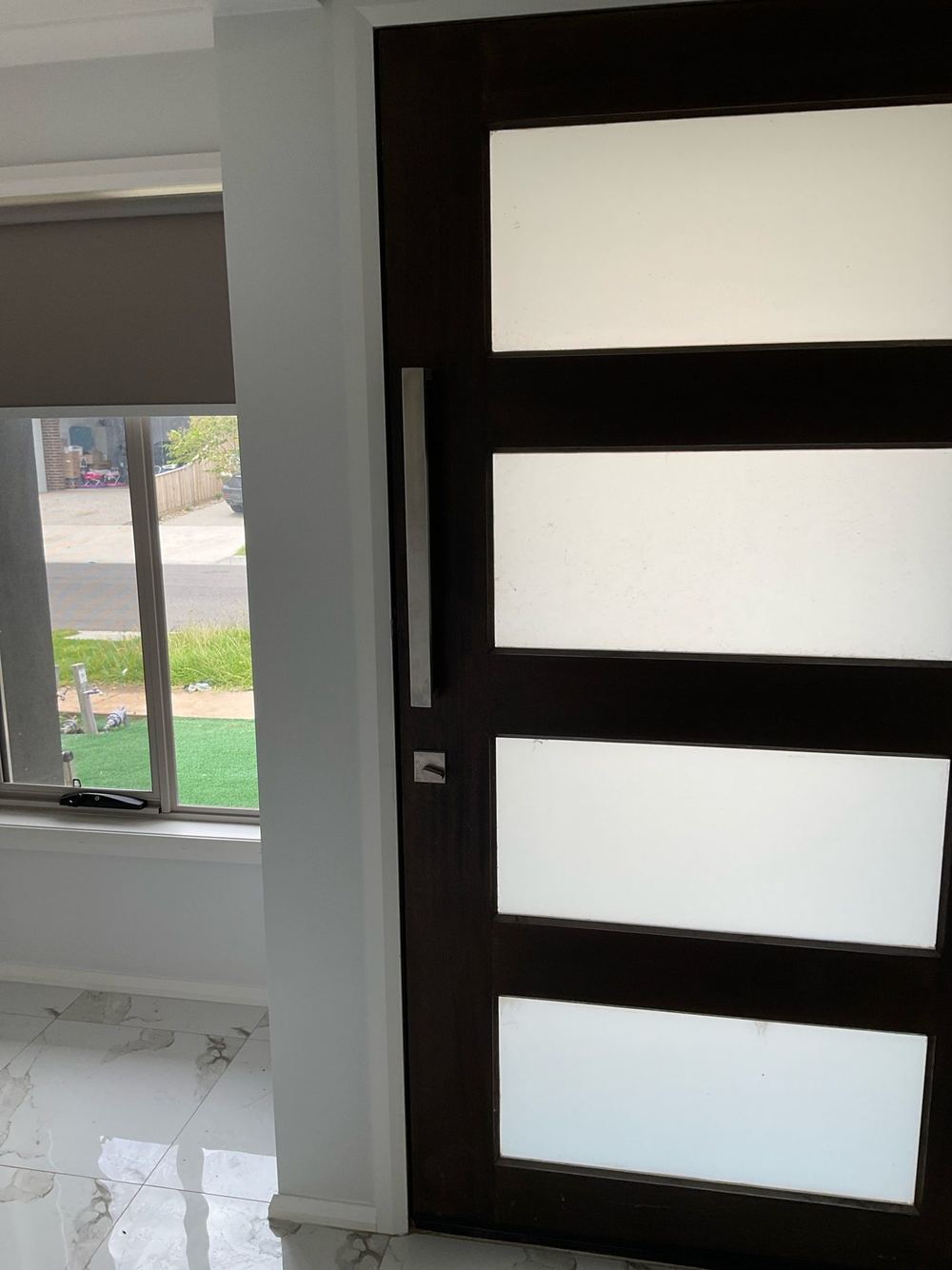 Door to frame gap outside the allowed 2mm to 5mm range, found during a pre-handover inspection in Tarneit