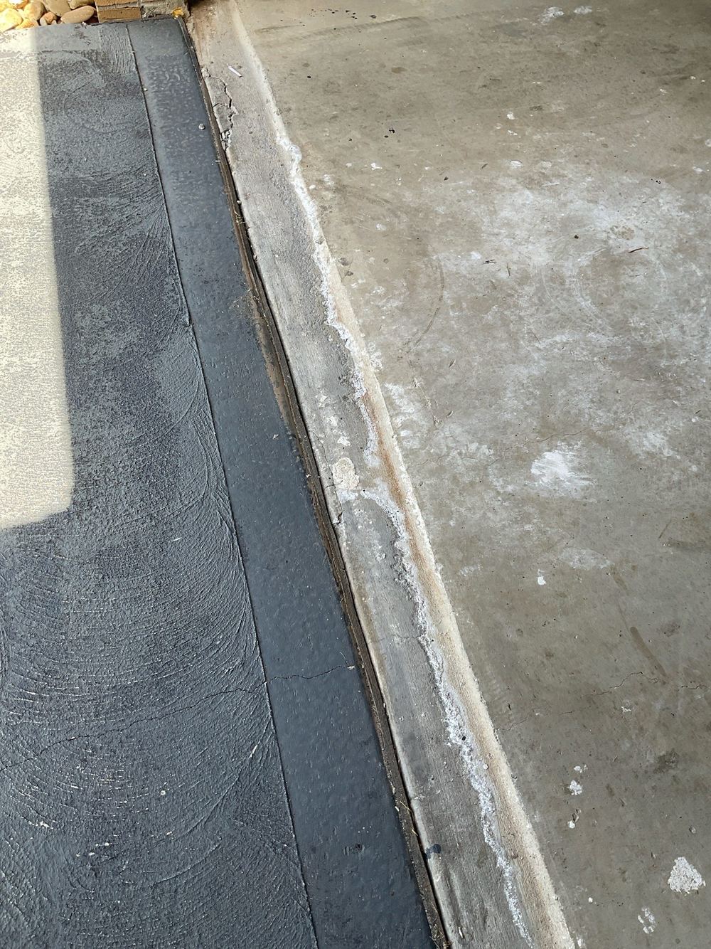 Chipped and damaged concrete, found during a pre-purchase inspection in Truganina