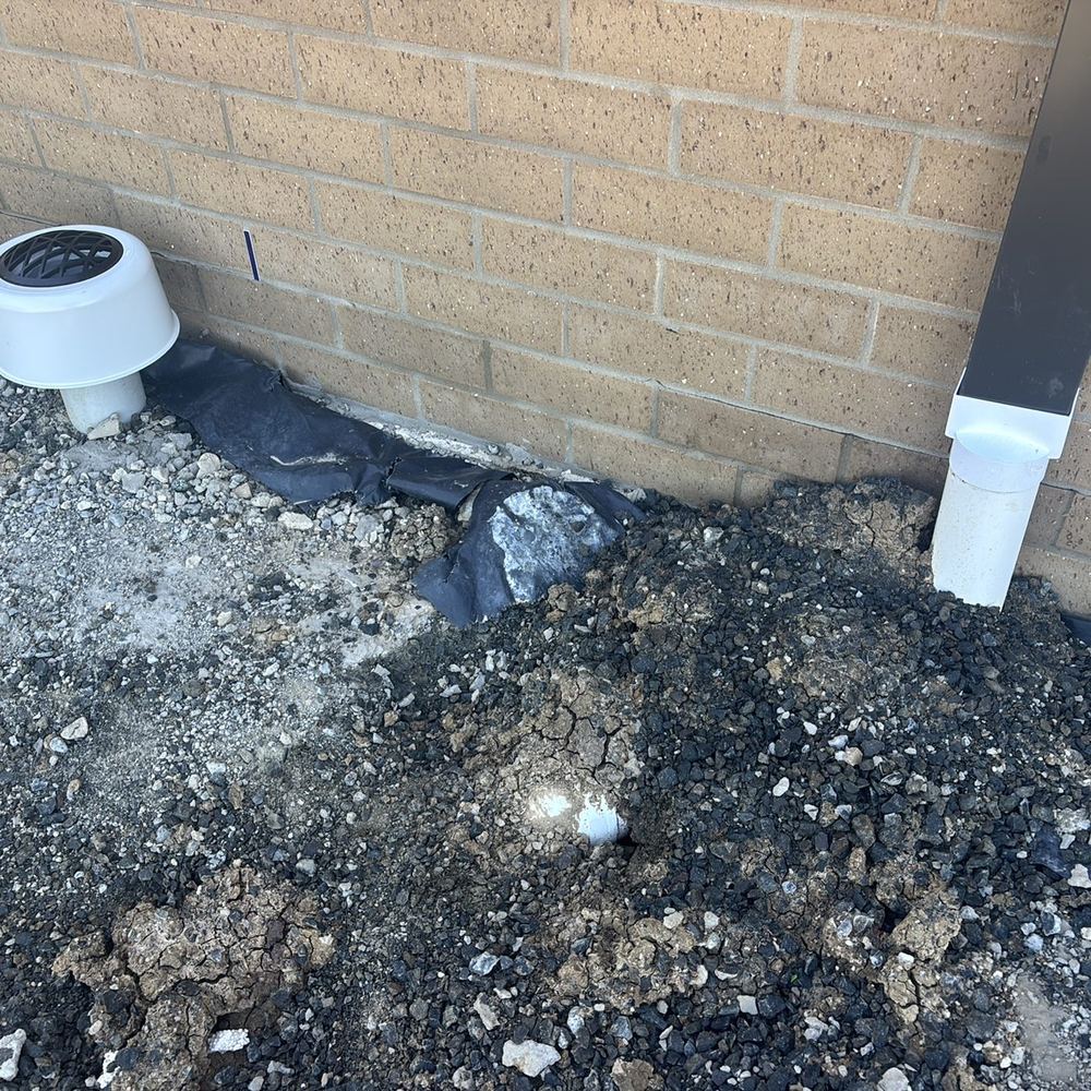Not enough cover over the stormwater pipe to protect it from damage, found during a building inspection in Tarneit