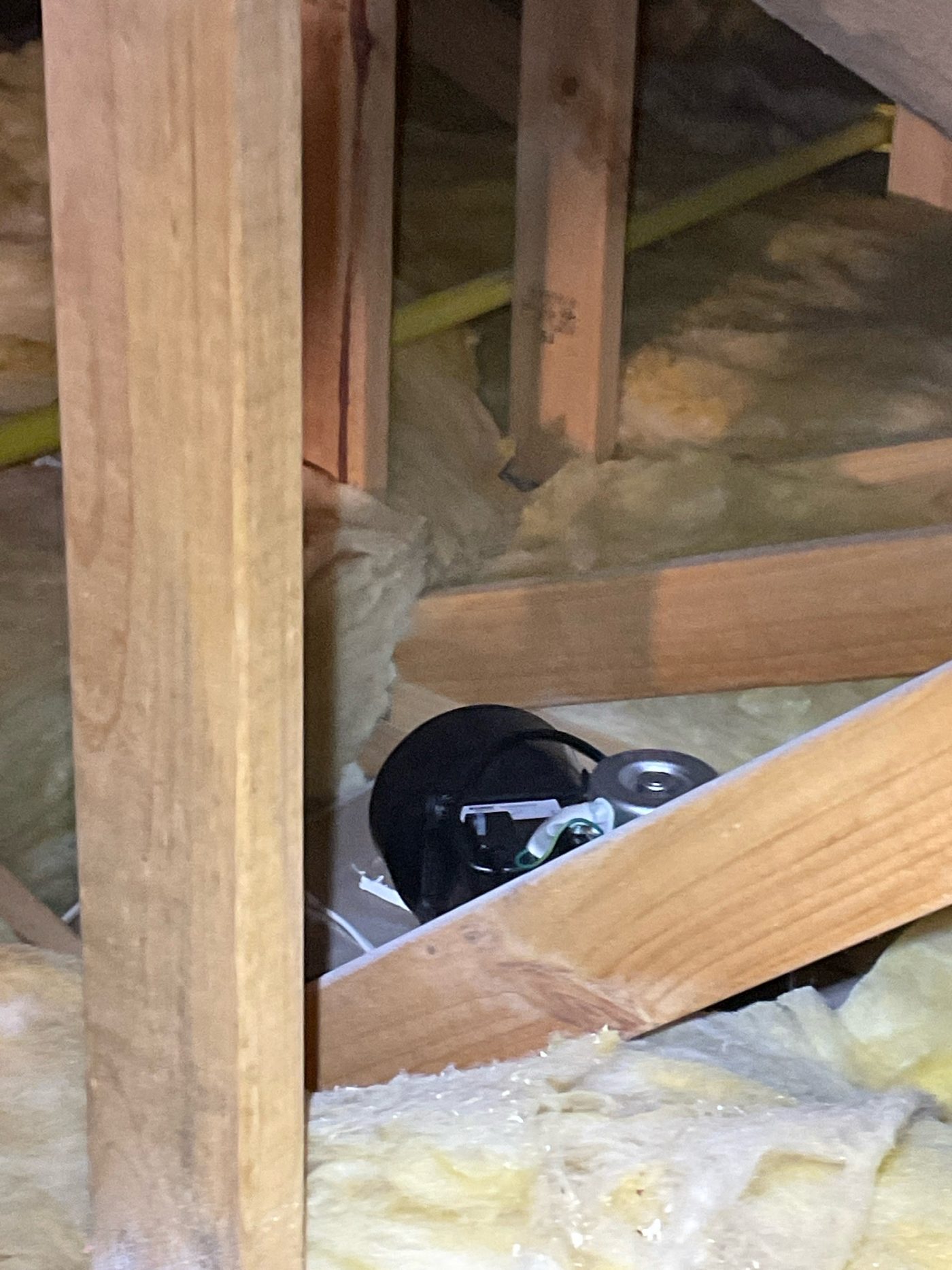 Exhaust fan venting into the roof space instead of outside, found during a practical completion inspection in Tarneit