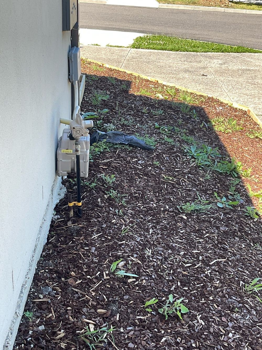 Ground sloping back towards the house, found during a building and pest inspection in Point Cook