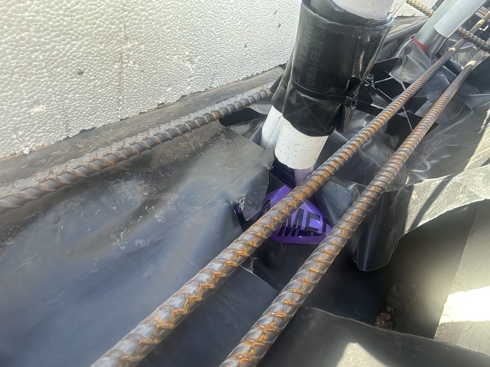 Pipe penetrations through the vapour barrier left unsealed, found during a slab pre-pour inspection in Tarneit