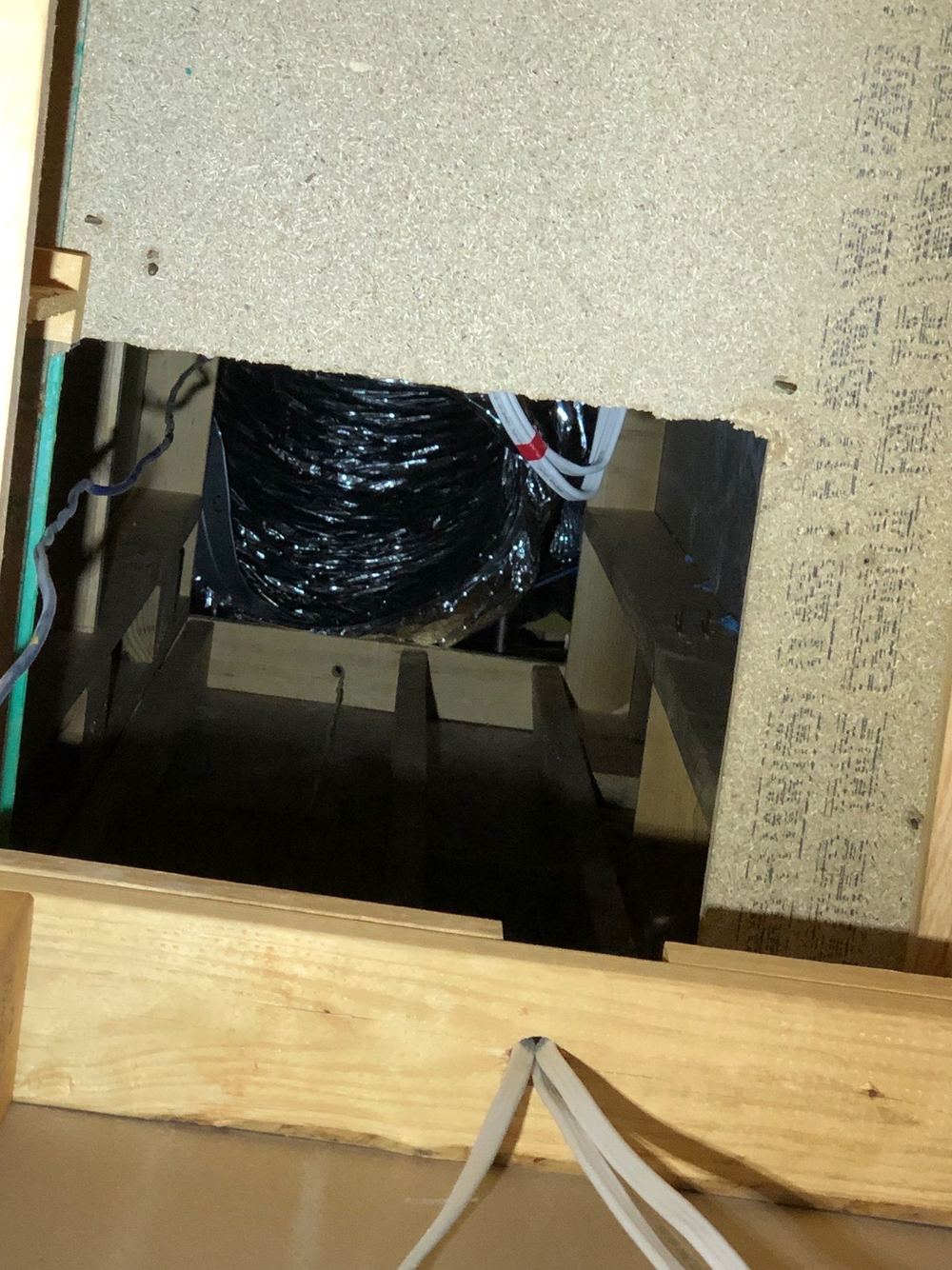 Return air plenum left unsealed, drawing roof dust back through the house, found during a construction stage inspection in Tarneit
