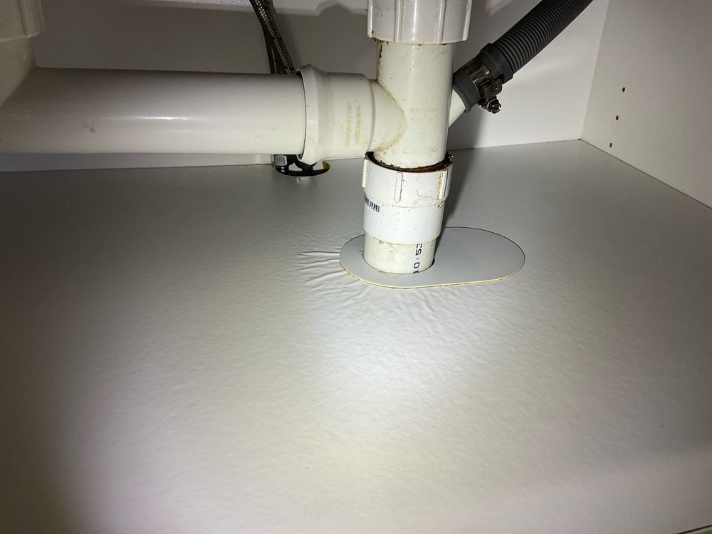 Water damaged cabinetry needing repair or replacement, found during a building and pest inspection in Point Cook